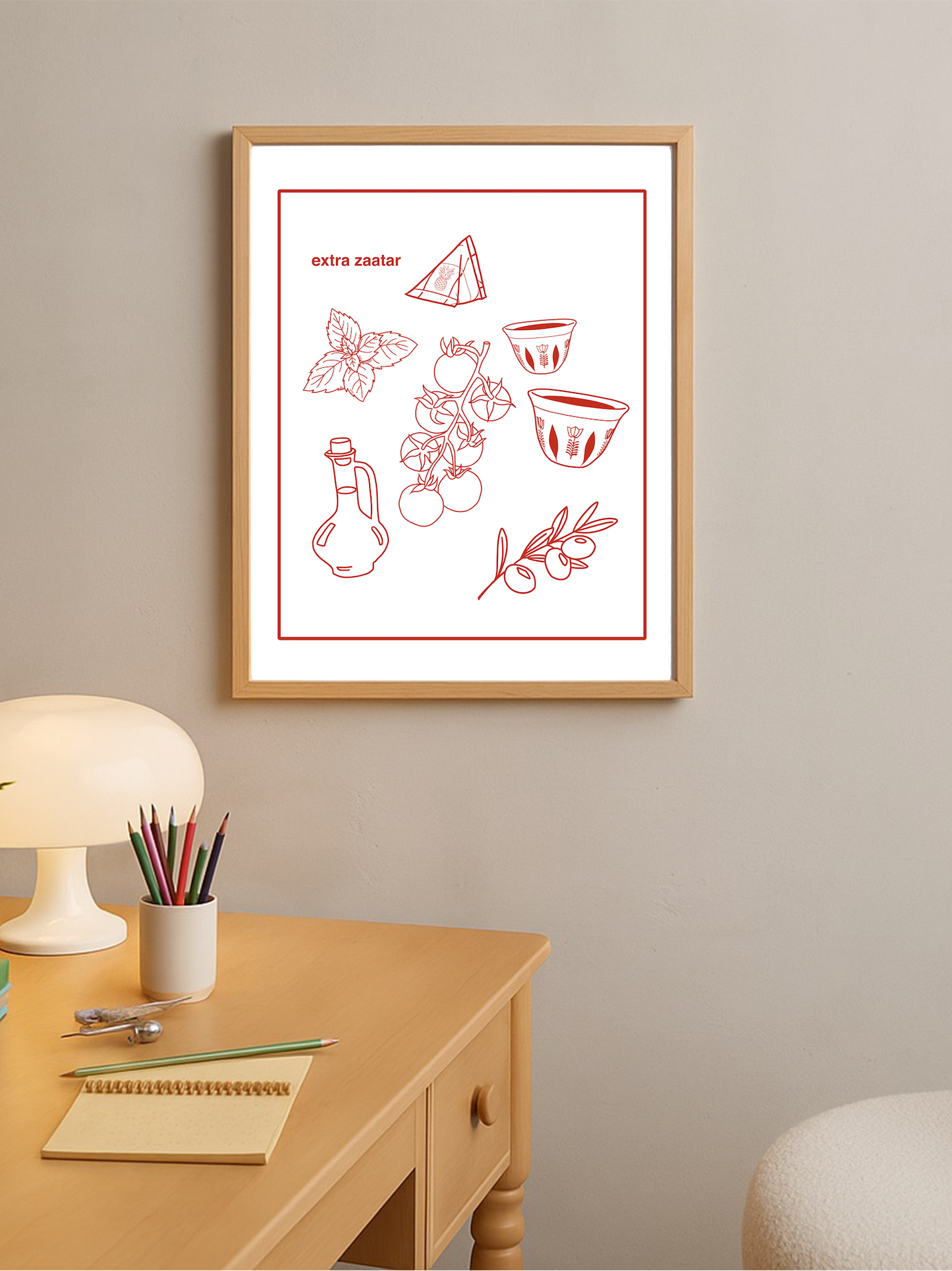 Framed artwork with words 'extra zaatar' and red line drawings of a Levantine breakfast on a white background