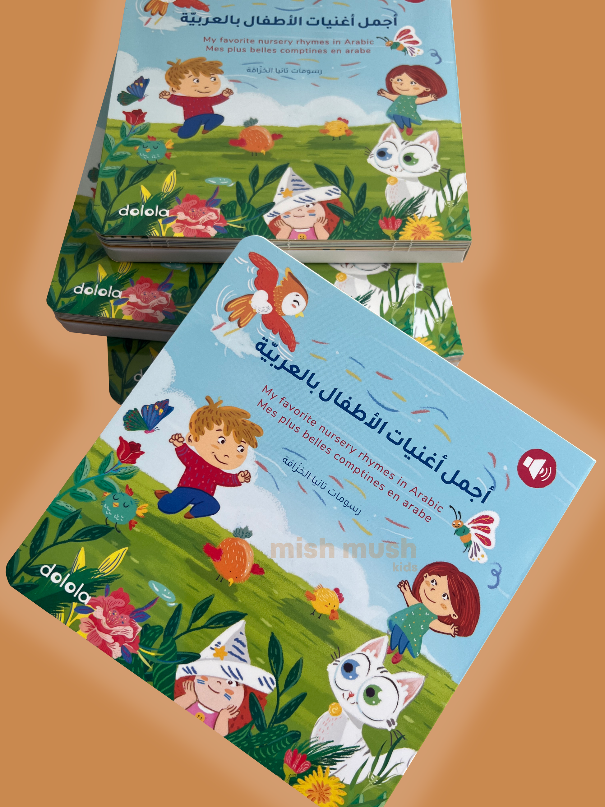 Two children's books with colorful covers featuring cartoon characters on a brown background.