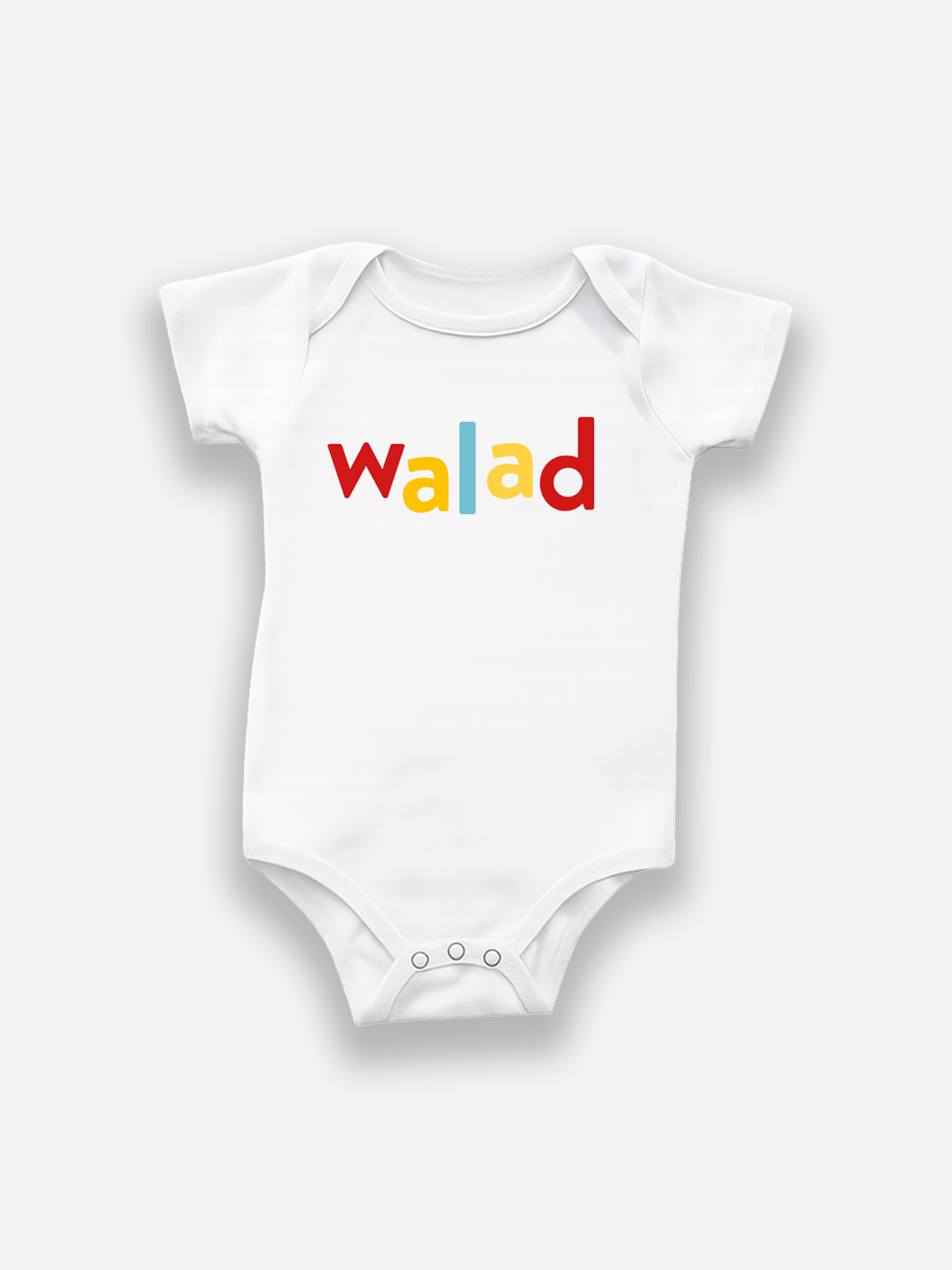 White baby onesie with 'Walad' printed in colorful letters on a white background